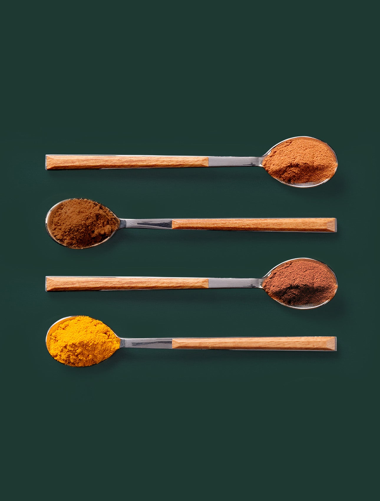 Spoons with different coffee spices